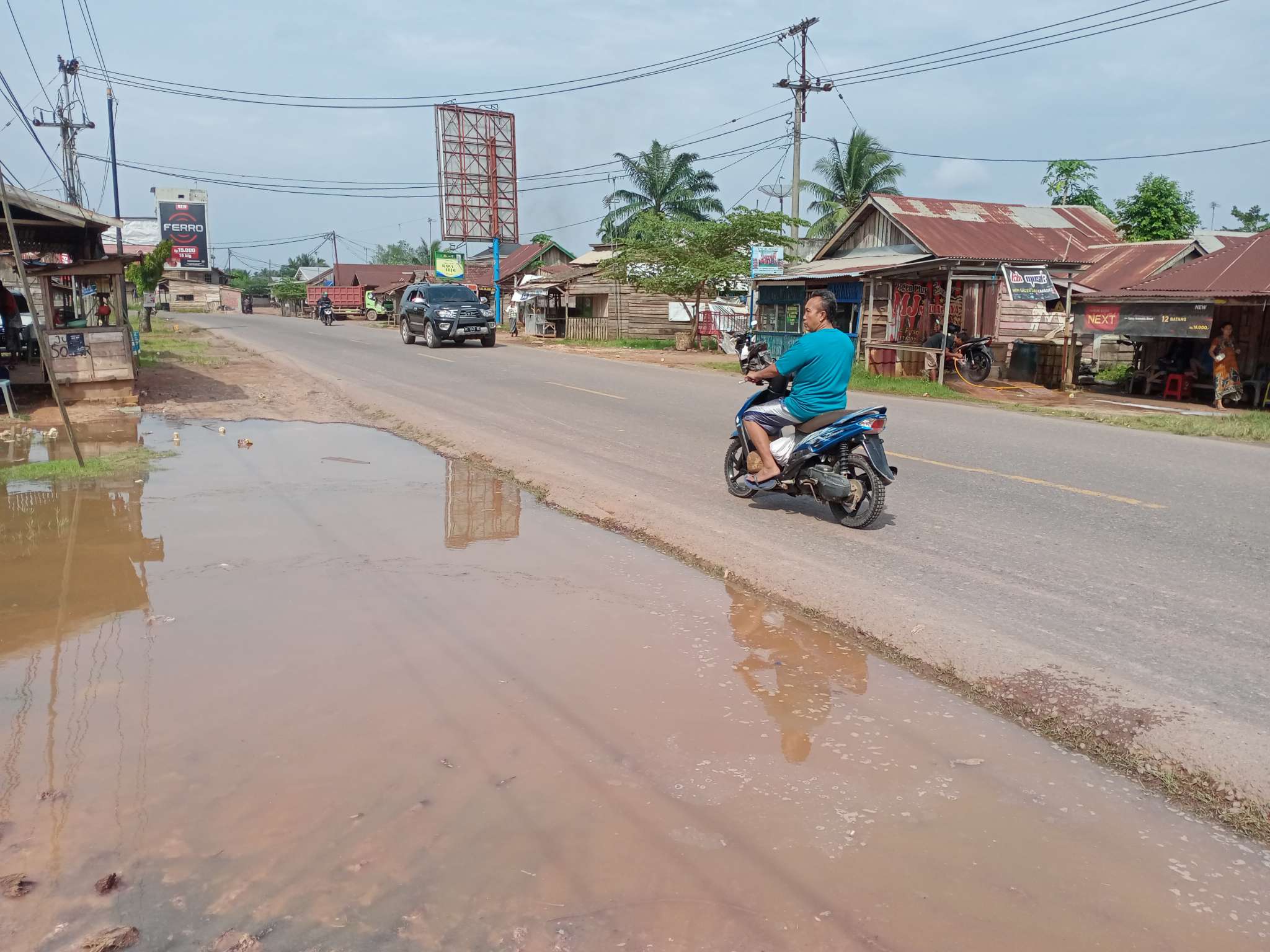 Air Pasang Dari Sungai Dawas Hampir Naik Ke Jalintim