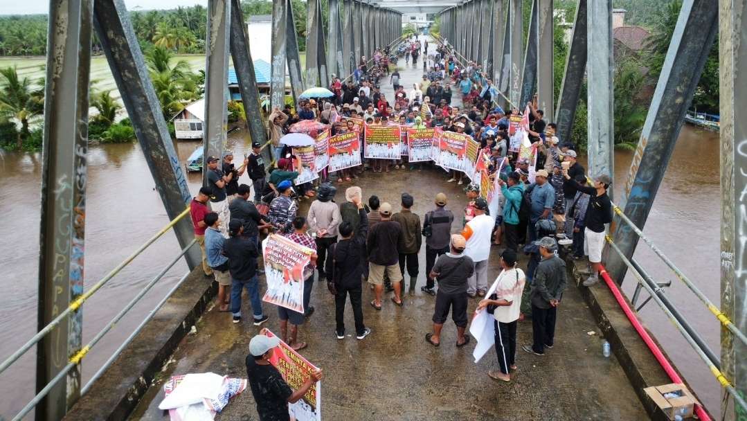 Aksi Damai di Jembatan Lalan, Warga Desak Pembangunan Dilanjutkan hingga Tuntas