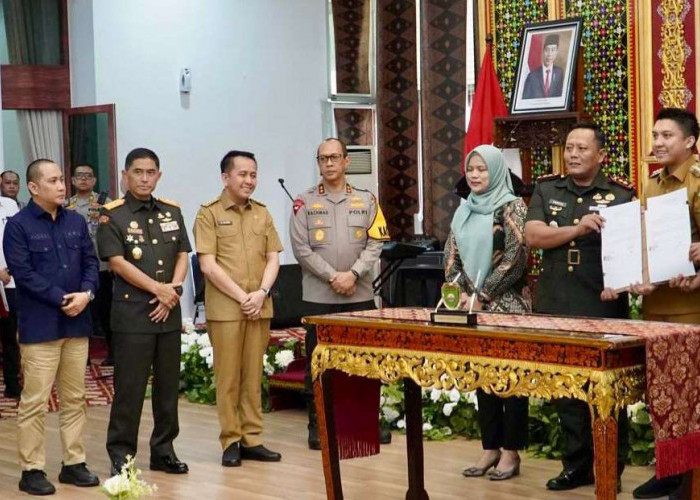 Pj Gubernur Sumsel Resmi Tandatangani NPHD Pengamanan Pilkada 2024 kepada TNI dan Polri